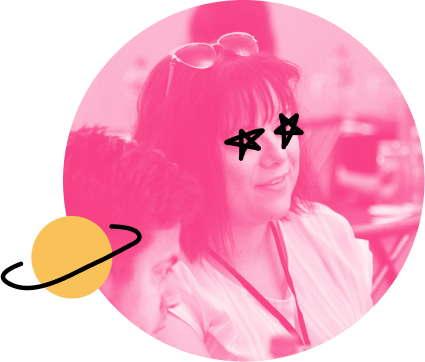 Photo of a woman looking toward the right with sunglasses on top of her head and black stars drawn over her eyes. Her photo is filtered in bright pink and has a doodle illustration of a yellow planet on the left that sort of looks like Saturn.