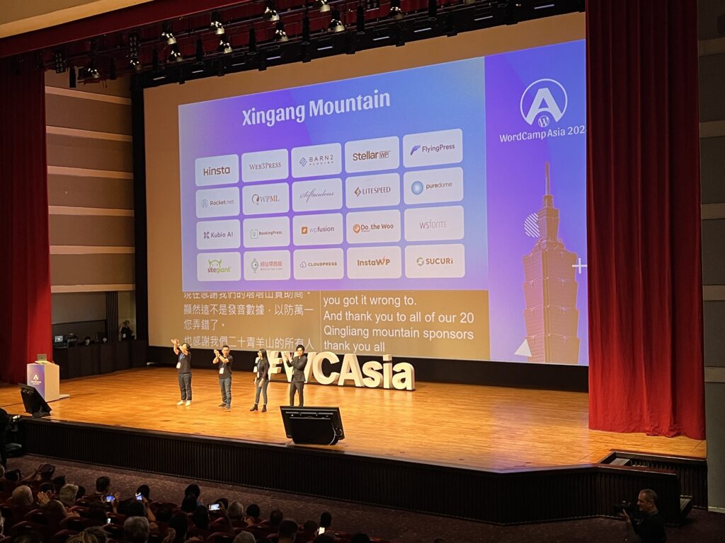 Lead organizers on the stage for opening remarks for WordCamp Asia