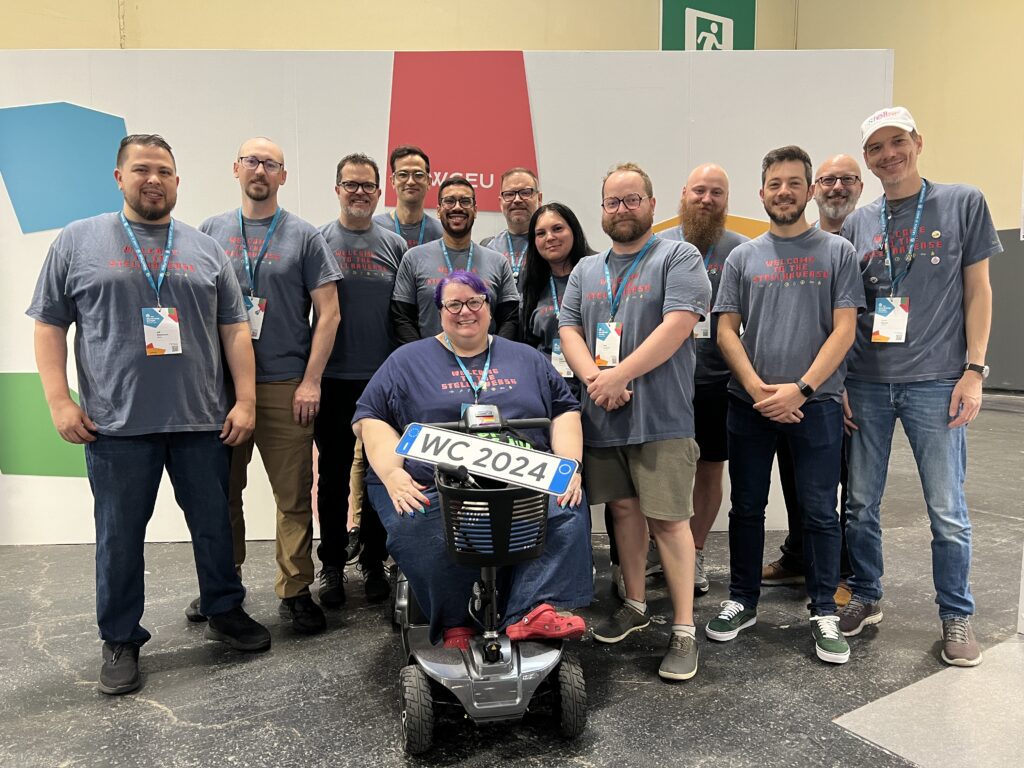 13 members of the StellarWP team at WordCamp Europe pose for a photo