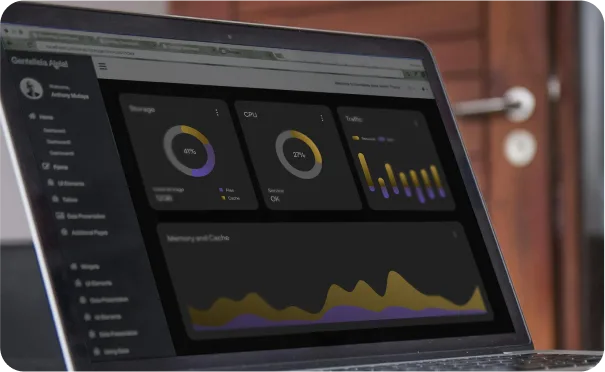 A laptop displaying a dark-themed dashboard with circular and bar charts showing storage, CPU, and traffic data.