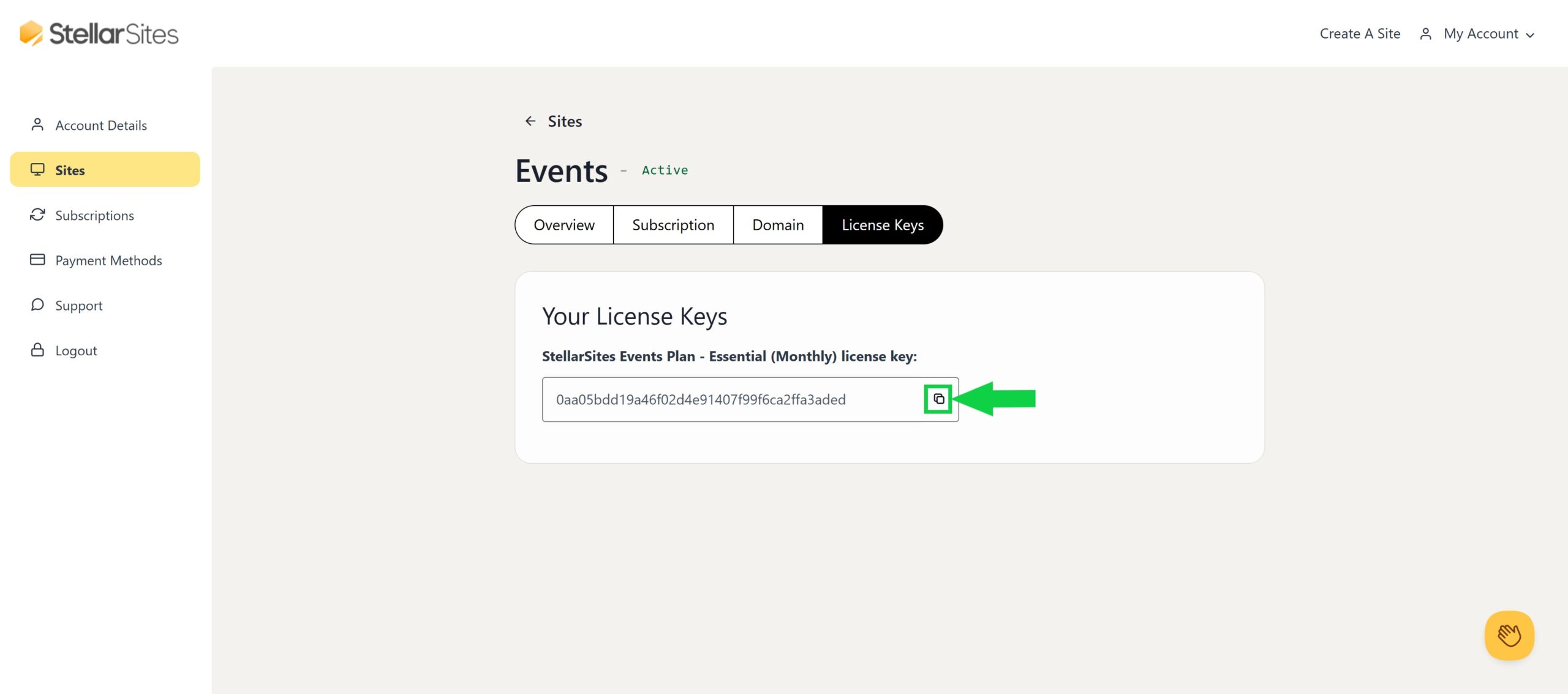 Screenshot of the StellarSites dashboard showing 'Sites' section in the sidebar highlighted. The main area displays a license key for a StellarSites Events Plan with a green arrow pointing to a copy icon next to the key.
