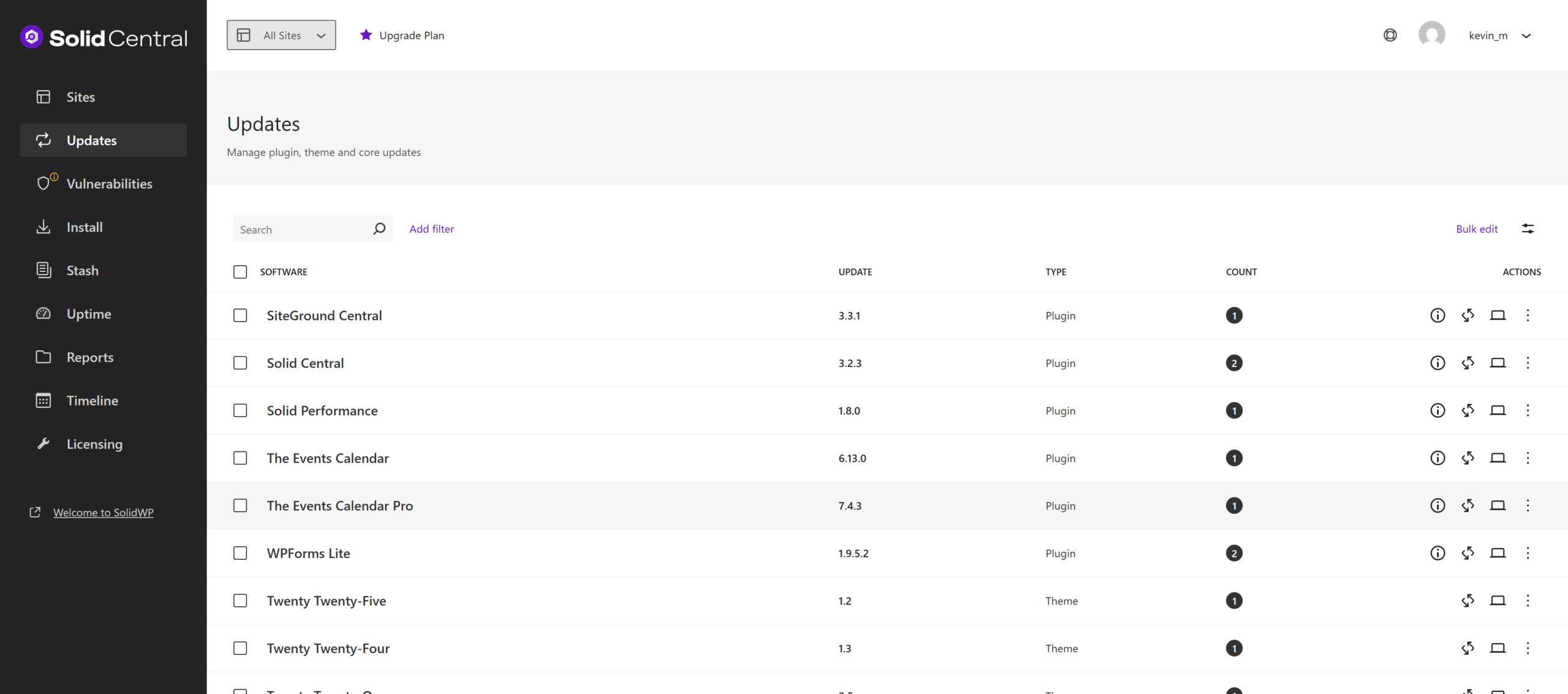 A dashboard titled 'Solid Central' is displayed, showing a list of software updates for various plugins and themes. The software names are listed alongside their current update versions, type (plugin or theme), count of available updates, and action buttons on the right. The sidebar includes navigation options such as Sites, Updates, Vulnerabilities, Install, Stash, Uptime, Reports, Timeline, and Licensing. The top bar includes options to filter updates by site and upgrade the plan.