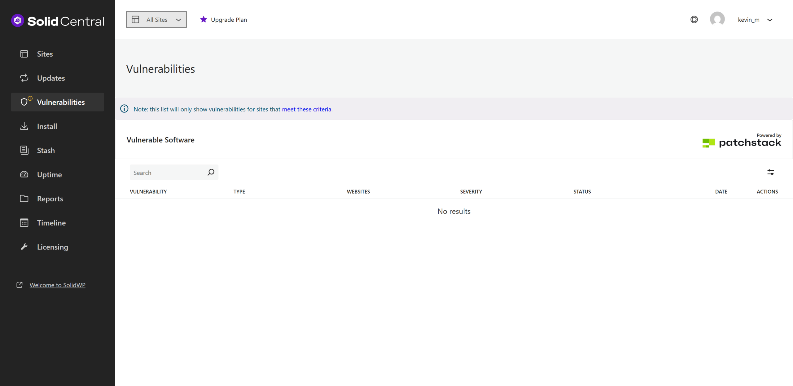 Screenshot of the Solid Central dashboard displaying the 'Vulnerabilities' section, showing no results for vulnerable software. The sidebar menu includes options like Sites, Updates, Install, Stash, Uptime, Reports, Timeline, and Licensing.
