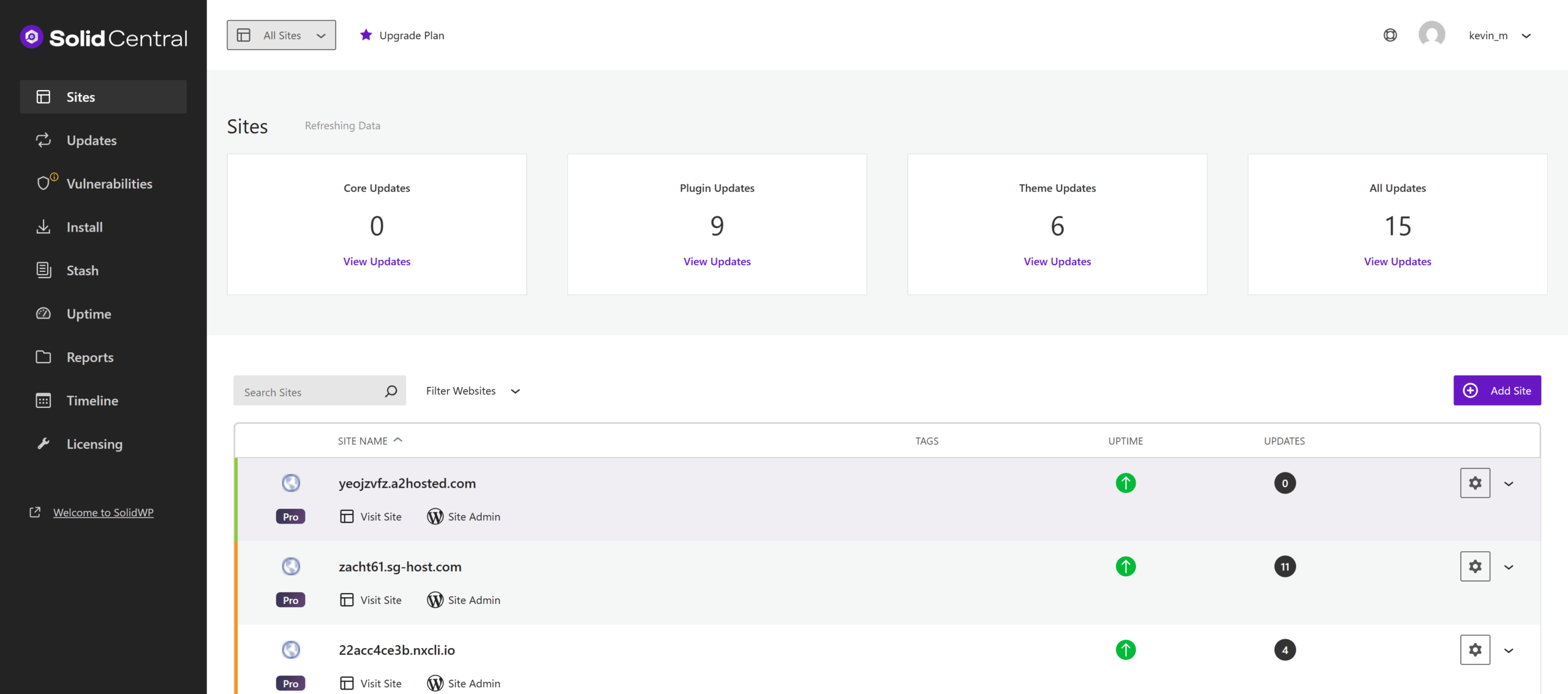 Screenshot of the Solid Central dashboard displaying site management features. The sidebar includes options like Sites, Updates, Vulnerabilities, and others. The main section shows update statistics with 0 Core Updates, 9 Plugin Updates, and 6 Theme Updates. A list of sites with names like yeojvfz.a2hosted.com is shown, each with uptime status and update information.