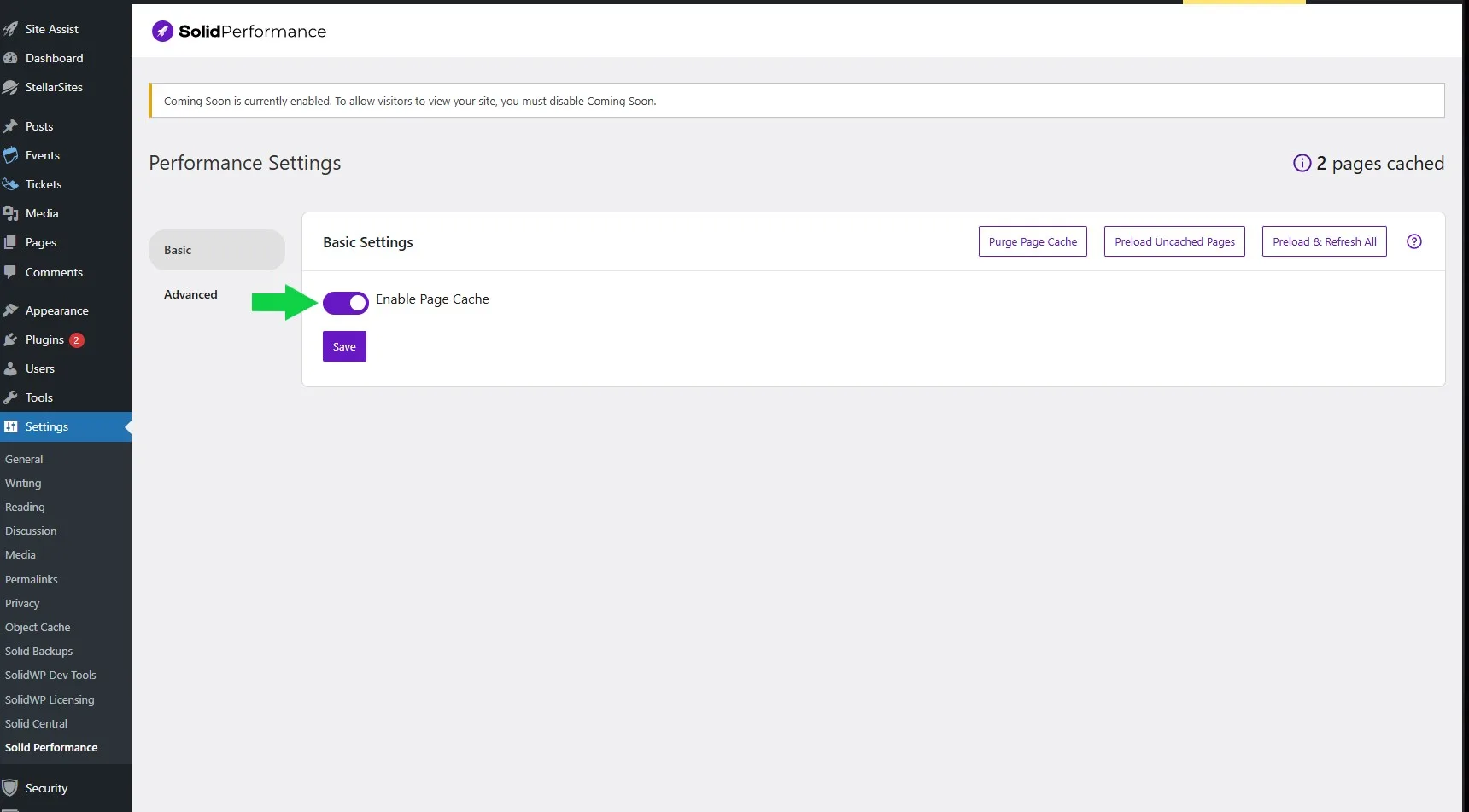 A settings page for 'Solid Performance' on a website dashboard, showing options for performance settings. The 'Enable Page Cache' toggle is switched on, highlighted with a green arrow, accompanied by a 'Save' button in purple. Additional buttons for purging and preloading are present. A notification indicates 'Coming Soon' is enabled, and 2 pages are cached.